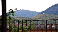 Vistas de la Ermita desde La Fuente Gorda. Detrás de ella, oculto, el Boquerón del Estena.